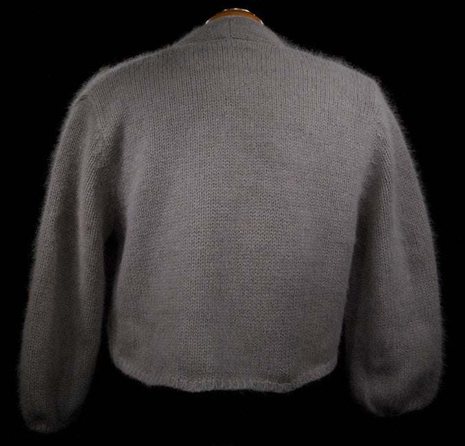 Grey woman's angora shrug cardigan sweater with three-quarter sleeves and open front design