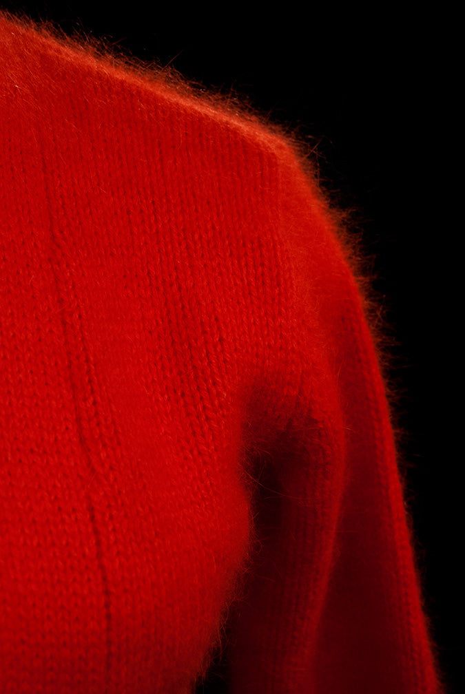 Red woman's angora shrug cardigan sweater with cropped three-quarter sleeves and open front design