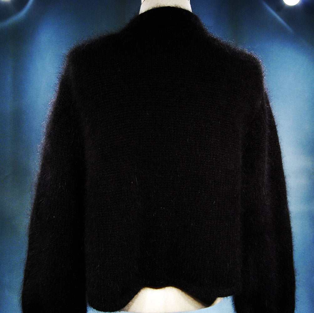 Black woman's angora shrug cardigan sweater with three-quarter sleeves and open front by Victoria's Secret