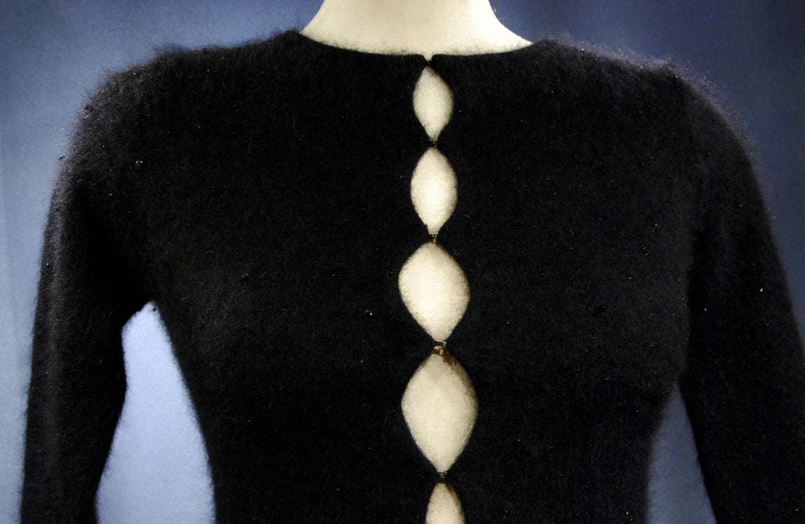 Woman's black angora cardigan sweater with unique hook and loop closures in size XX-Small