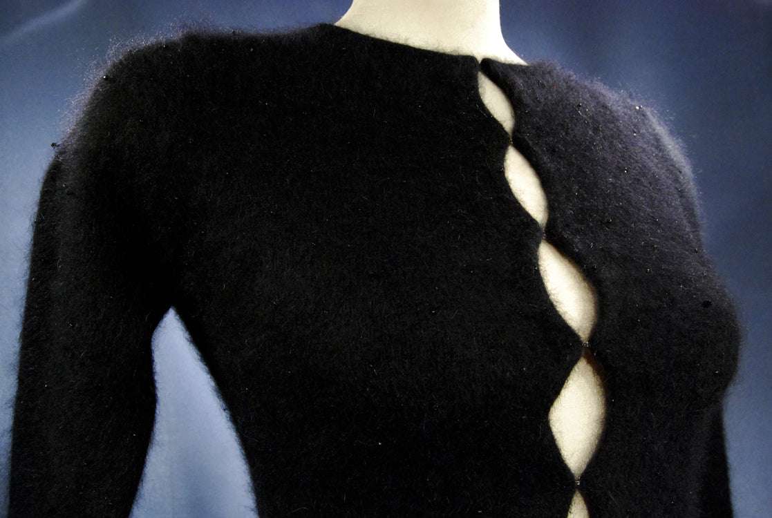 Woman's black angora cardigan sweater with unique hook and loop closures in size XX-Small