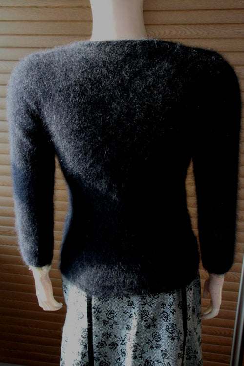 Woman's black angora cardigan sweater with long sleeves and hook and loop closures, size XX-Small