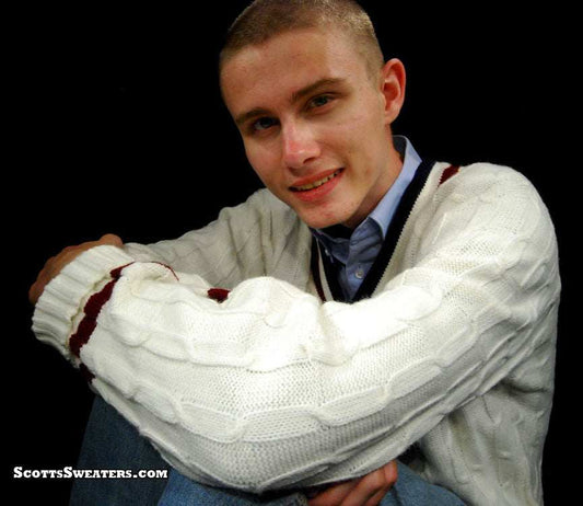 Men's classic V-neck retro cable-knit white tennis sweater with maroon trim worn by model