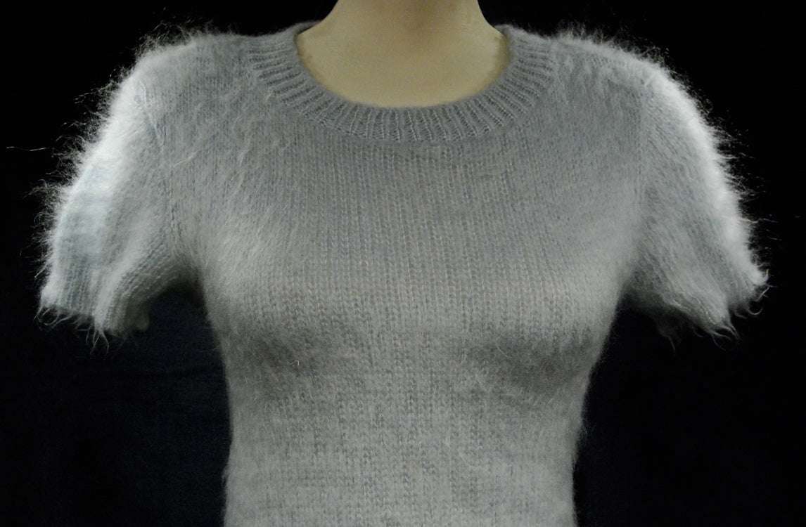 Powder-blue mohair soft fuzzy short-sleeve sweaterdress on mannequin