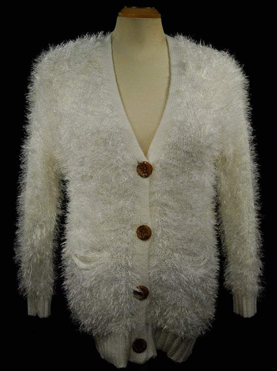 Woman's eyelash cardigan sweater with long fuzzy acrylic fibers, imitation rabbit fur, four buttons, and front pockets in white.