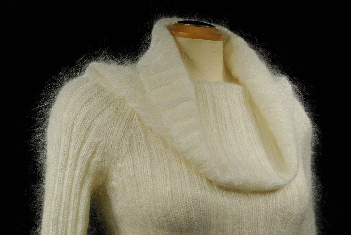 Woman's white fuzzy mohair cowlneck sweater with deep collar and ribbed texture, medium size