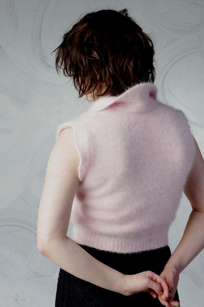 Woman's pink angora sleeveless cropped polo-neck sweater back view