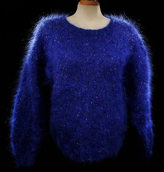 Woman's blue speckled fuzzy mohair sweater with knit-in red, green, yellow, and blue specks, medium size