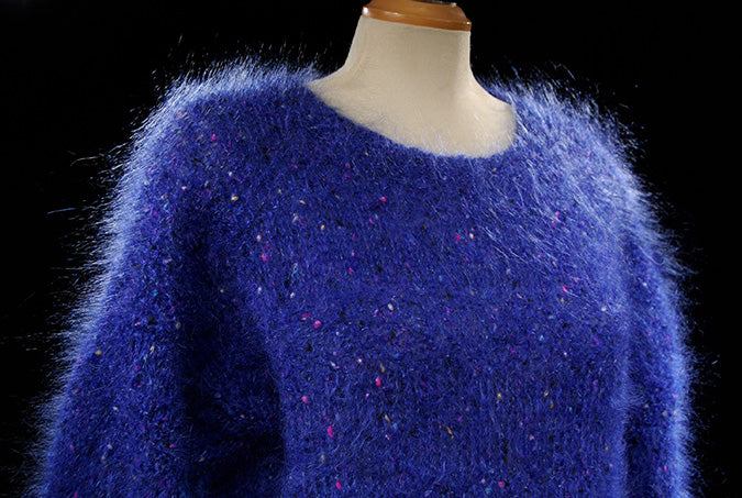 Woman's medium blue speckled mohair V-neck sweater with knit-in colorful specks by Icelandic Design