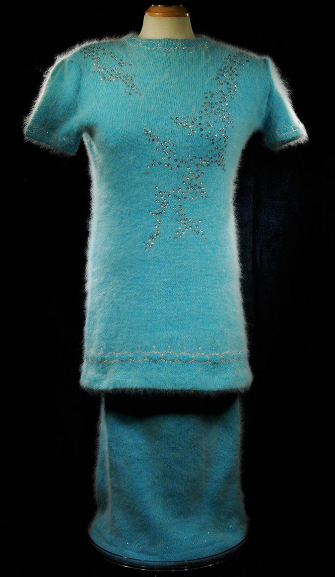 Woman's two-piece matching aqua angora sweater dress outfit with silver sequins and rhinestone embellishments