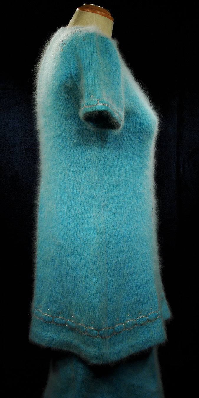 Woman's two-piece matching aqua angora sweaterdress outfit with sequins and rhinestone accents by Mary Farrin