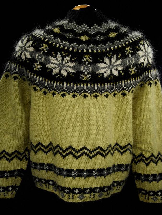 Woman's black and pale-yellow angora sweater with Nordic snowflake design and zipper front