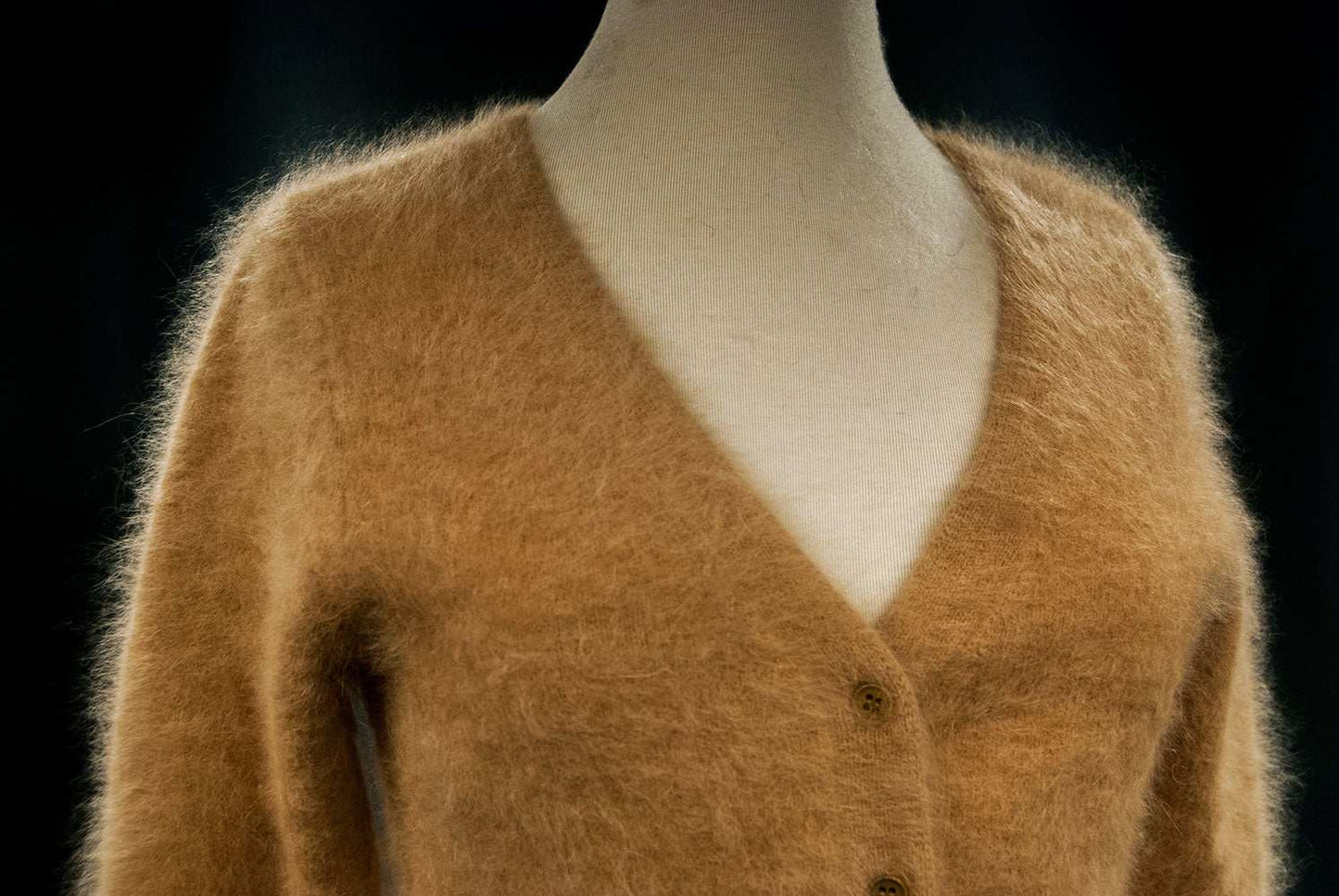 Beige woman's cardigan angora sweater by J.Crew in small size on mannequin