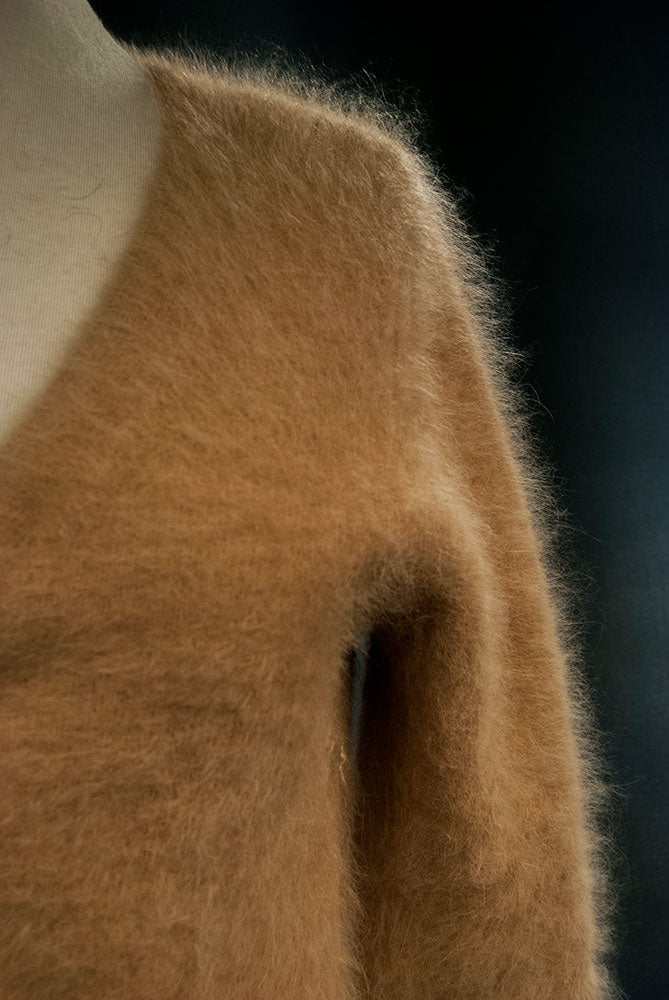 Close-up of beige angora woman's cardigan sweater by J.Crew in small size