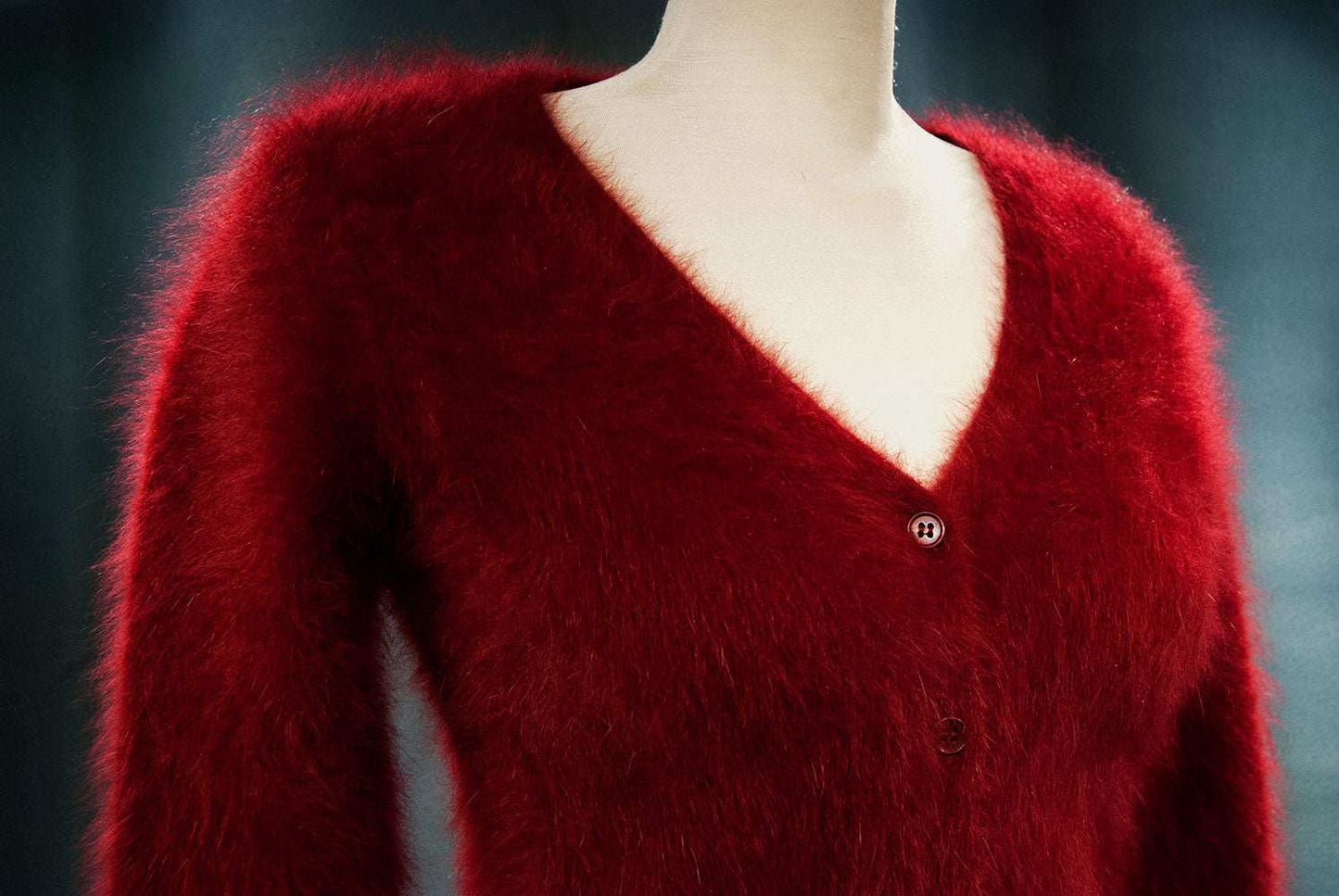Red woman's angora cardigan sweater by J.Crew in small size on mannequin