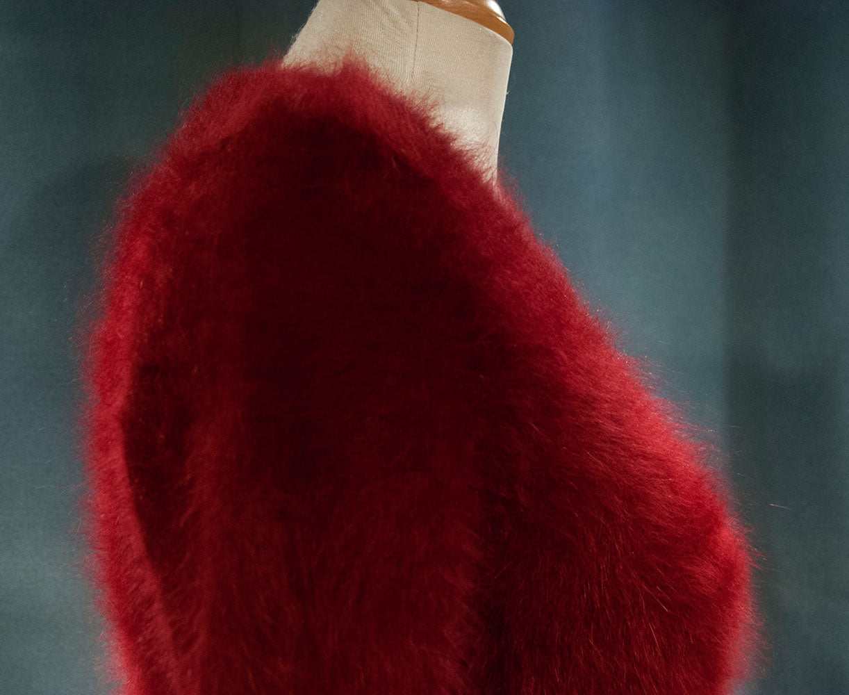 Red angora woman's cardigan sweater by J.Crew on mannequin