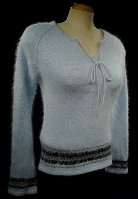 Powder blue woman's angora tie-neck sweater with blue and grey horizontal stripes and fuzzy texture