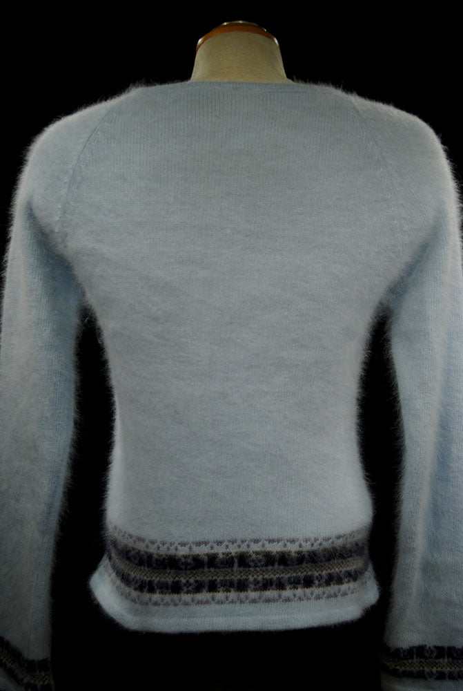 Powder blue fuzzy angora tie-neck sweater with blue and grey horizontal stripes on sleeves and hem