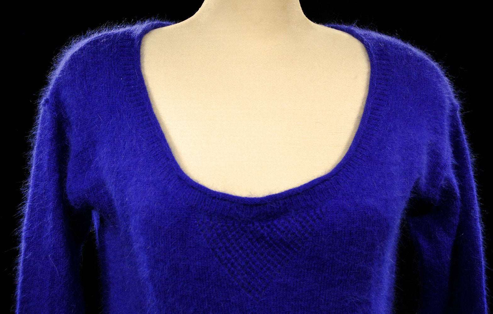 Woman's royal-blue angora scoop-neck sweater by Victoria's Secret on mannequin