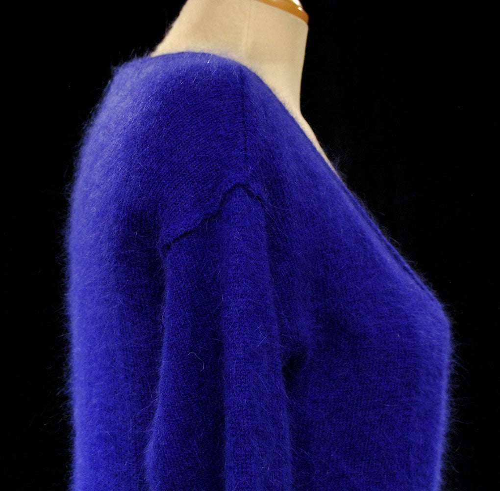 Woman's royal-blue angora scoop-neck sweater by Victoria's Secret displayed on mannequin