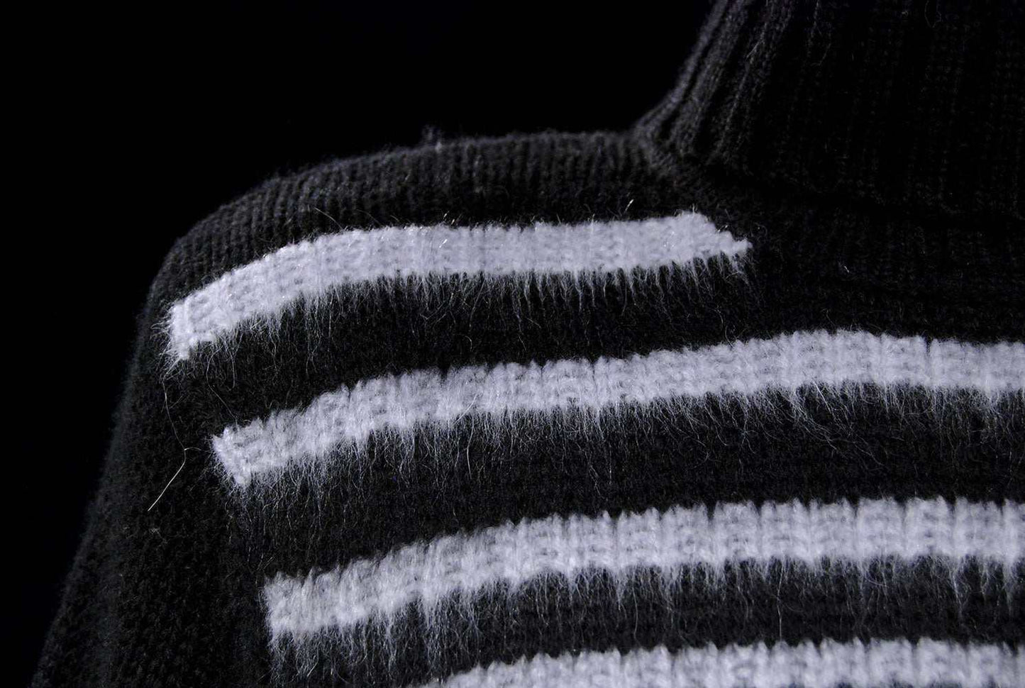 Men's soft black turtleneck sweater with white horizontal angora stripes and fuzzy lambswool texture