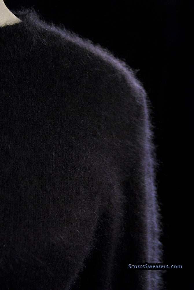 Woman's black angora crewneck sweater by Express Tricot in close-up texture view