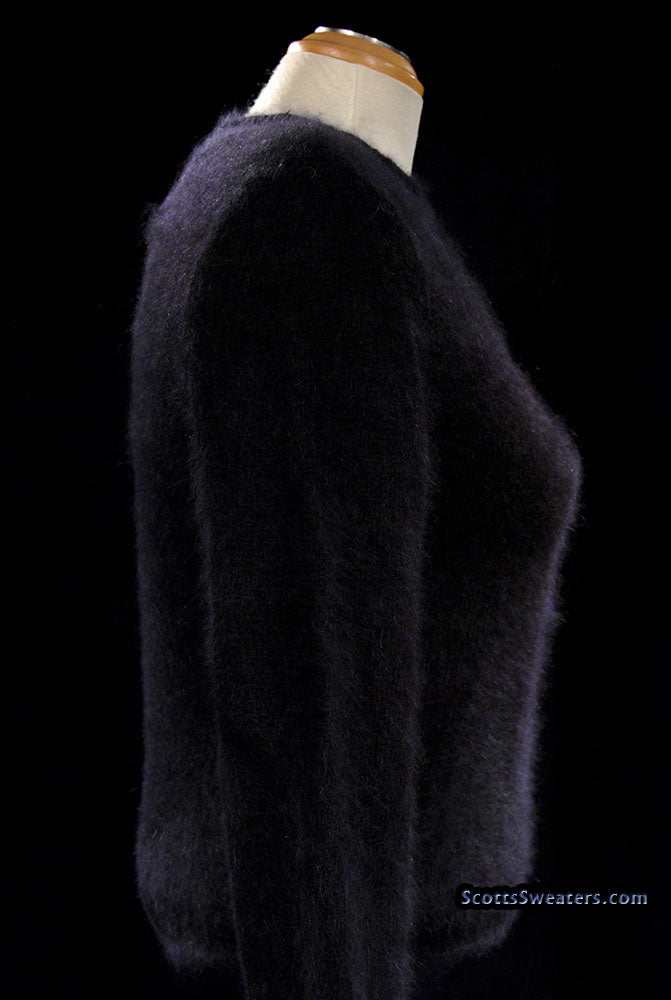 Woman's black angora crewneck sweater by Express Tricot on mannequin