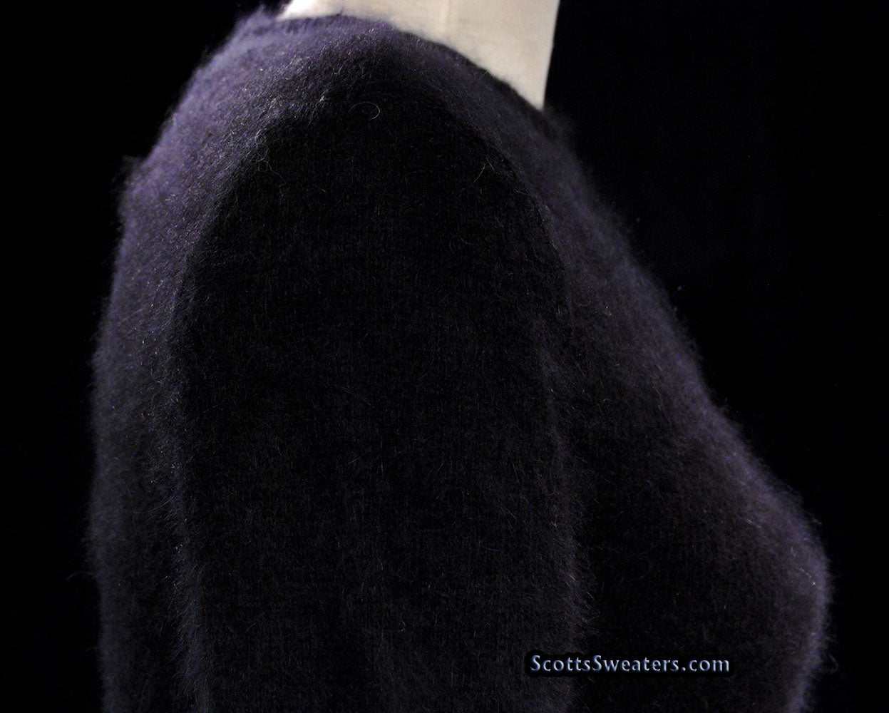 Woman's black angora crewneck sweater by Express Tricot in soft fuzzy texture