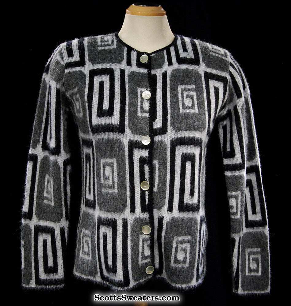 Woman's retro Mad Men's era faux mohair cardigan sweater with black, white, and grey psychedelic swirl pop-art design