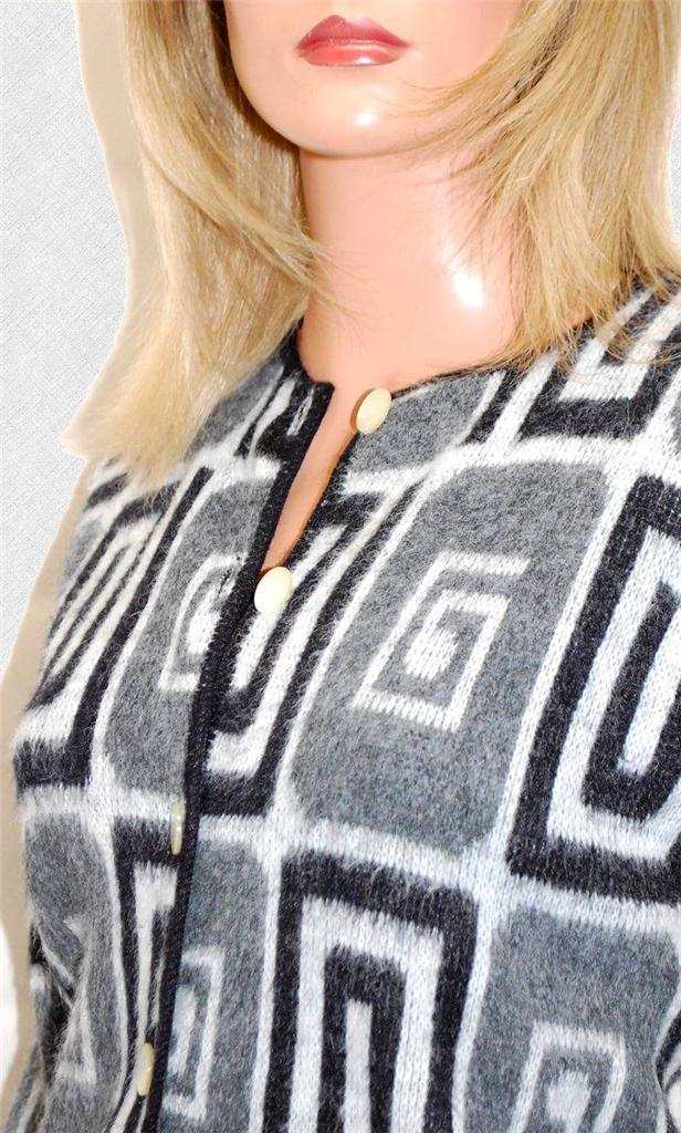 Woman's retro Mad Men's era black, white, and grey faux mohair cardigan sweater with psychedelic swirl pop-art design