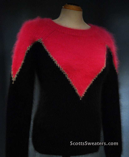 Two-tone angora sweater by Juicy Couture with bold red and black design