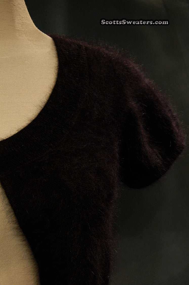 Woman's angora shrug cardigan sweater by Express with jeweled rhinestone button in dark color