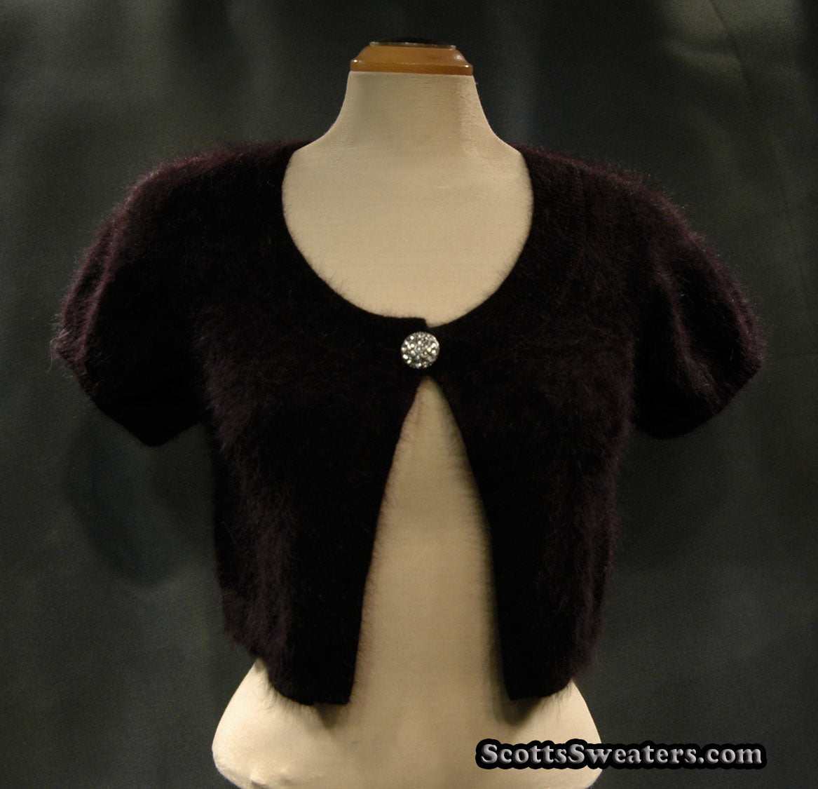 Woman's black angora shrug cardigan with jeweled rhinestone button by Express