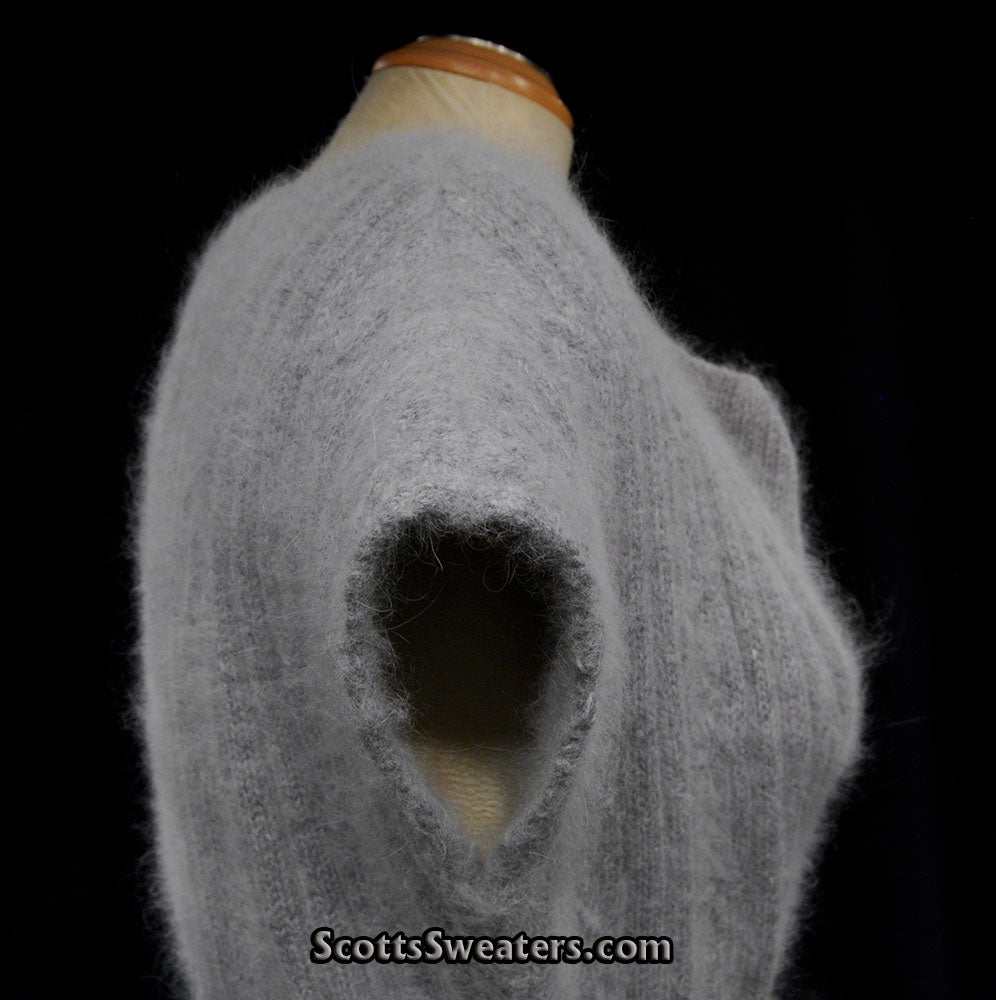 Light grey Angora sweaterdress by Willi Smith with cowl neck, size large, displayed on mannequin against black background