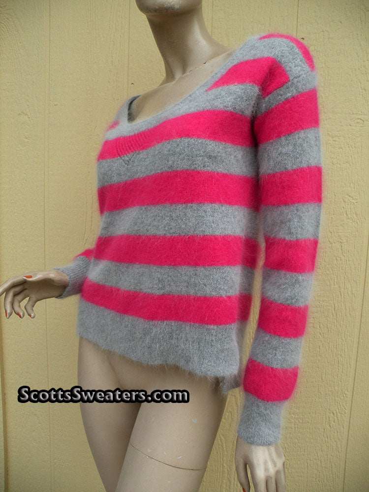 Woman's pink and grey striped angora cardigan sweater by MODA International on mannequin