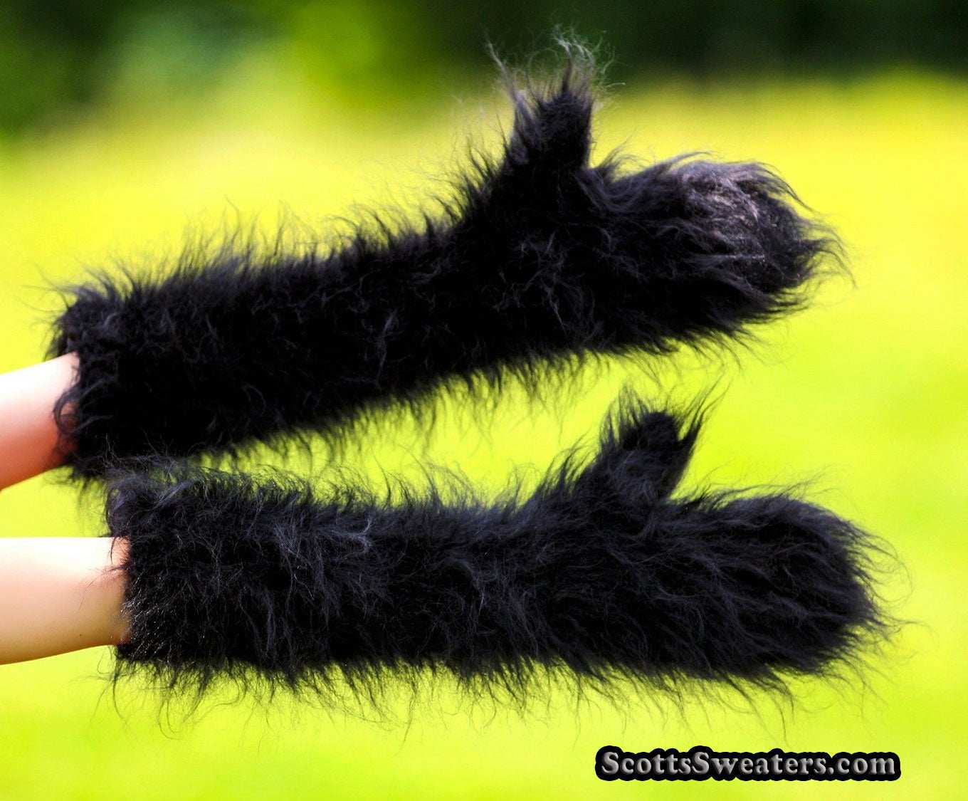 Extra-long fuzzy black hand-knit mohair mittens with rib-knit forearm length design
