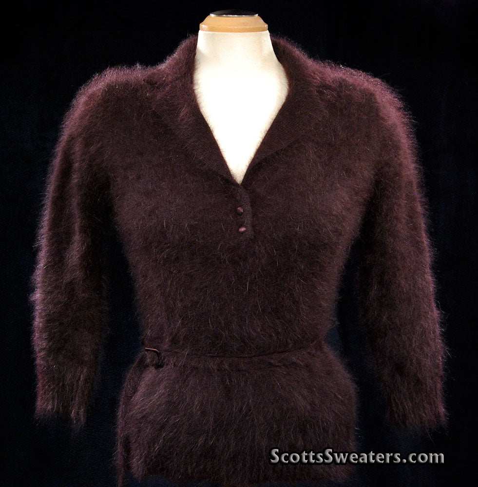 Woman's luxurious brown angora shawl-collar sweater with buttons and narrow waist belt by Monsoon