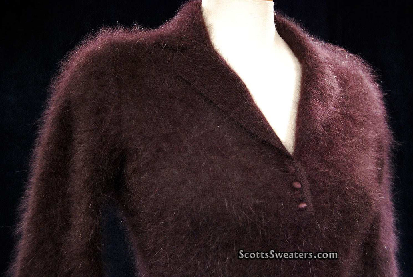 Woman's luxurious brown angora shawl-collar sweater with buttons and narrow waist belt by Monsoon
