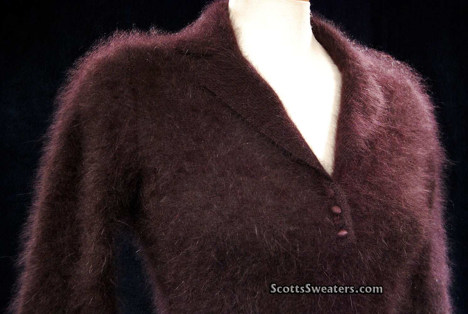 Woman's luxurious brown angora shawl-collar sweater with buttons and narrow waist belt by Monsoon