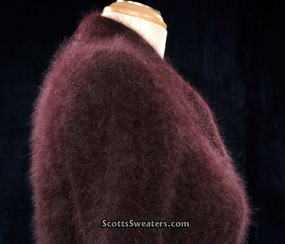 Woman's luxurious brown angora shawl-collar sweater with 3/4 sleeves and narrow waist belt by Monsoon