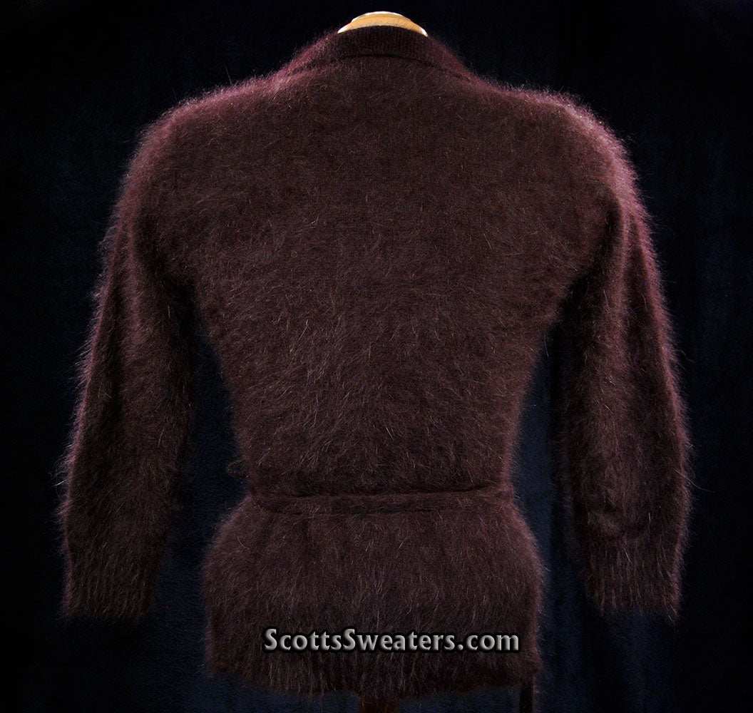 Woman's luxurious brown angora shawl-collar sweater with 3/4 sleeves and narrow waist belt by Monsoon
