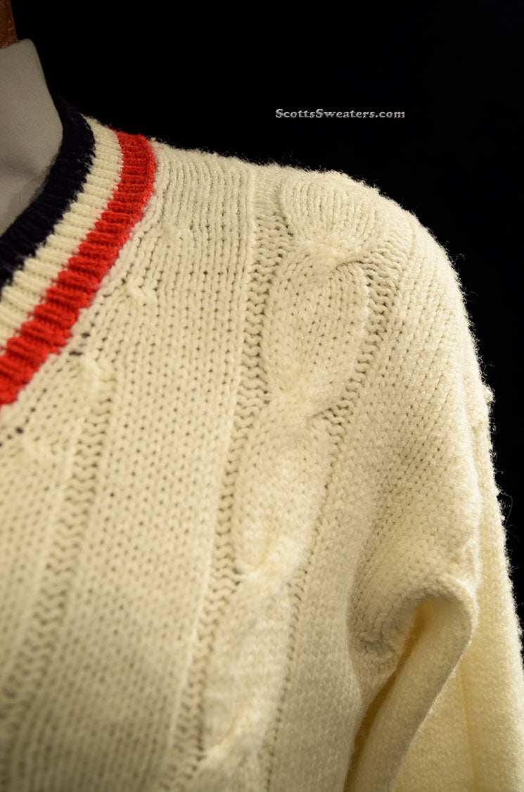 Classic V-neck Pullover retro cable-knit tennis sweater in cream with red and navy striped neckline, size small.