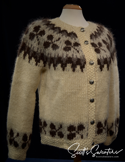 Woman's Icelandic wool cardigan sweater in natural brown with traditional pattern and metal buttons