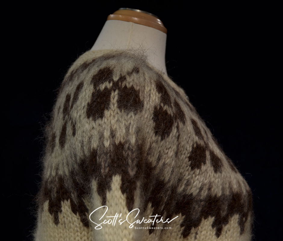 Natural brown Icelandic wool cardigan sweater for women with traditional metal button-front design displayed on a mannequin