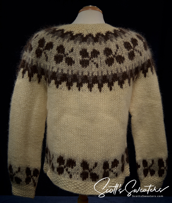 Woman's Icelandic wool cardigan sweater in natural brown with traditional patterned yoke and metal buttons, medium size