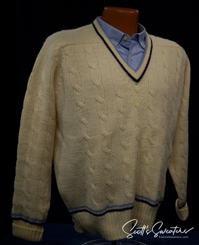 Retro classic ivory wool cable-knit tennis sweater with navy and French blue striped trim