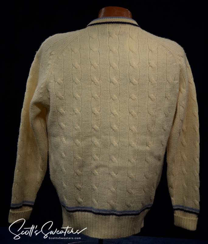 Retro classic ivory wool cable-knit tennis sweater with navy and French blue striped trim