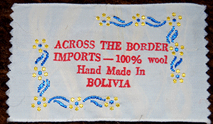 Men's brown native patterned alpaca crewneck sweater with black, brown, and white Aztec design medium size