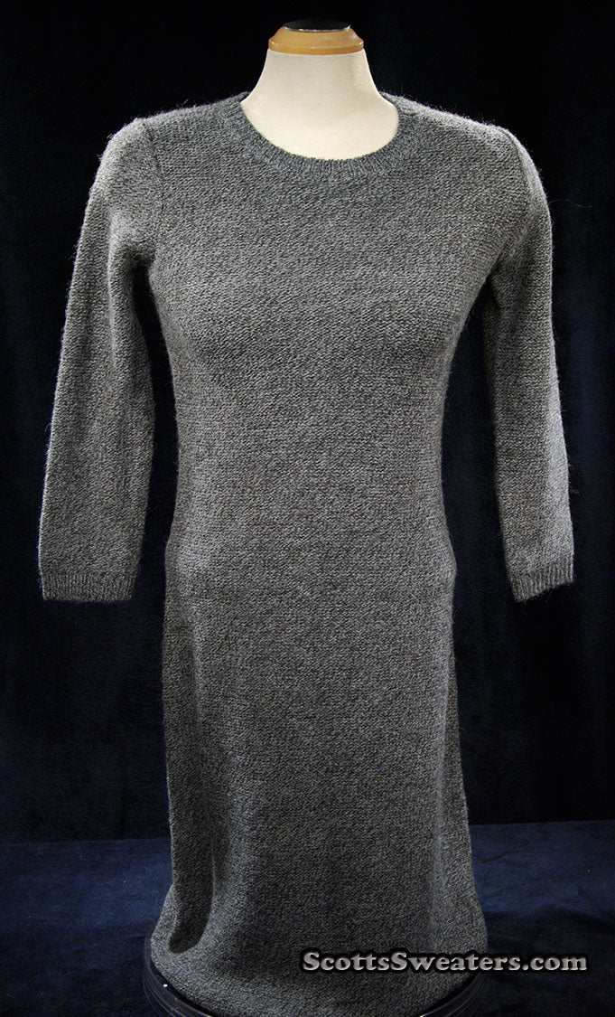 Woman's grey alpaca-merino wool sweaterdress with long sleeves and crew neck on mannequin