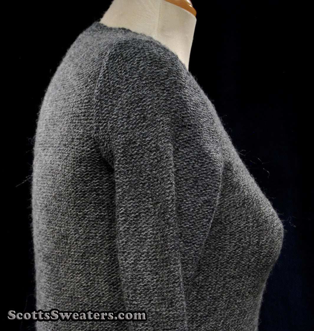 Woman's grey alpaca-merino wool sweaterdress side view on mannequin